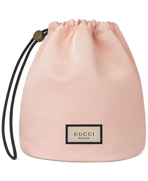 free gucci pouch with perfume.